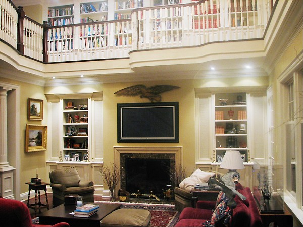 Fireplace mantel and cabinetry by deBoer Cabinets