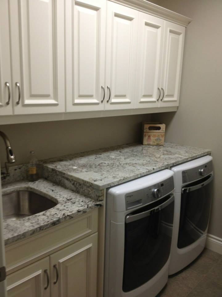 Laundry room cabinetry by deBoer Cabinets